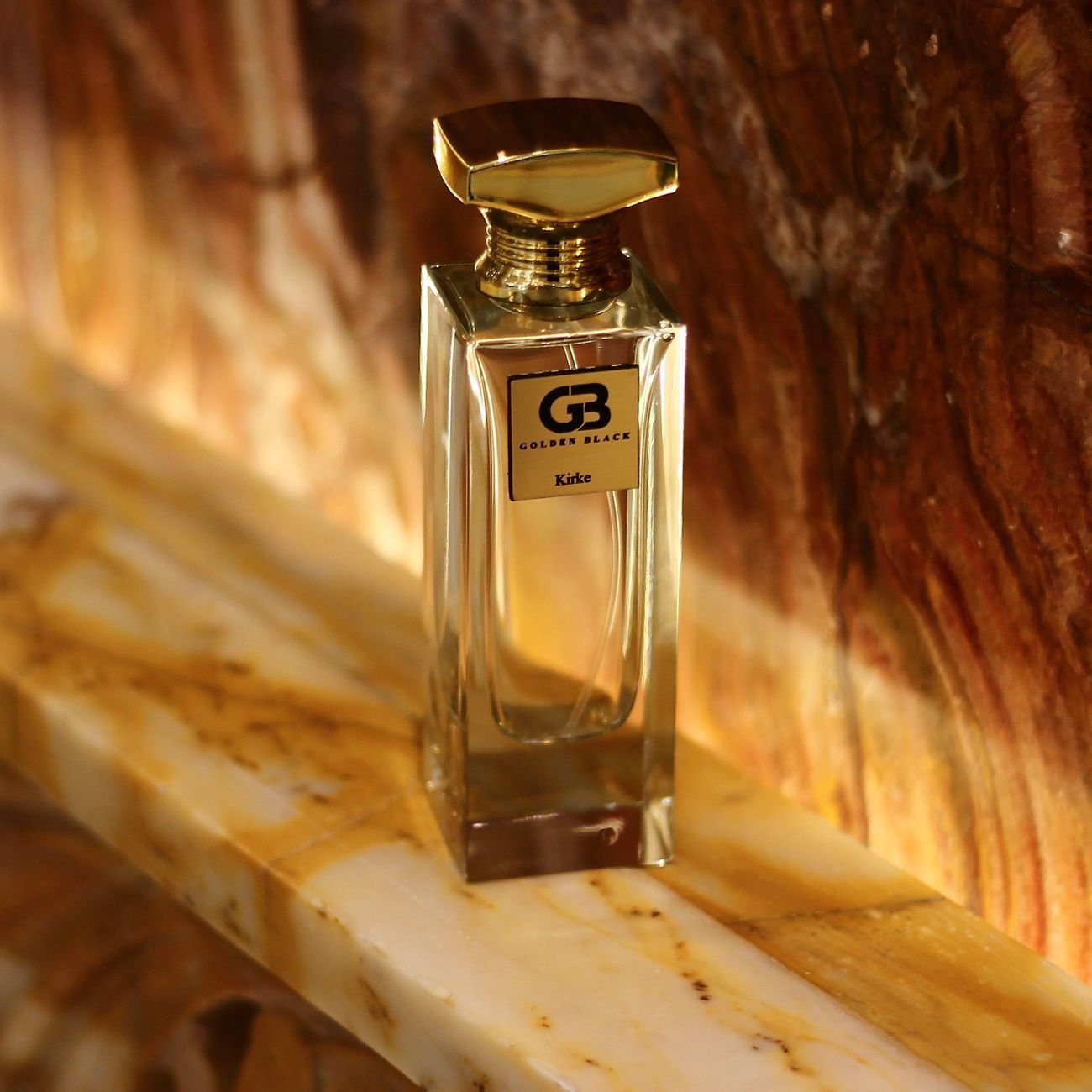 Warm golden-toned nail polish bottle on marble — Lacé No. 02 Ambre